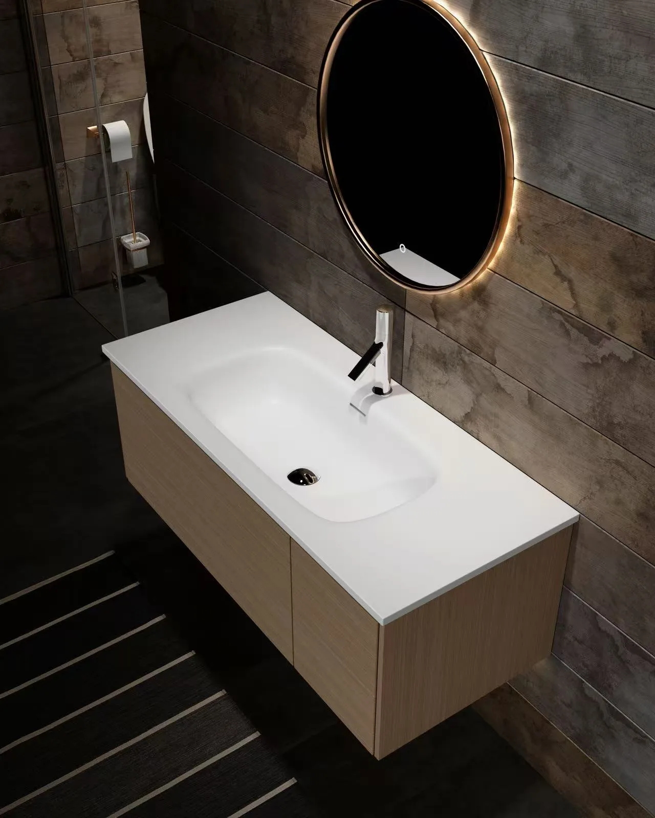 Angle view of a commercial solid surface vanity top mounted on a hospitality vanity cabinet, highlighting the homogenous material.