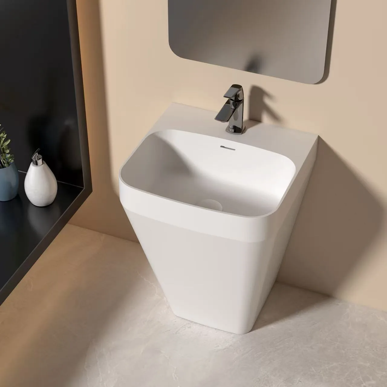 High-angle view of a matte white freestanding solid surface sink showcasing the integrated faucet deck and flared basin profile.