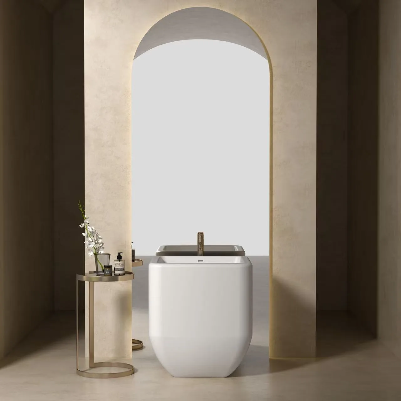 Matte white square freestanding solid surface sink installed in an earthy minimalist luxury hotel bathroom.