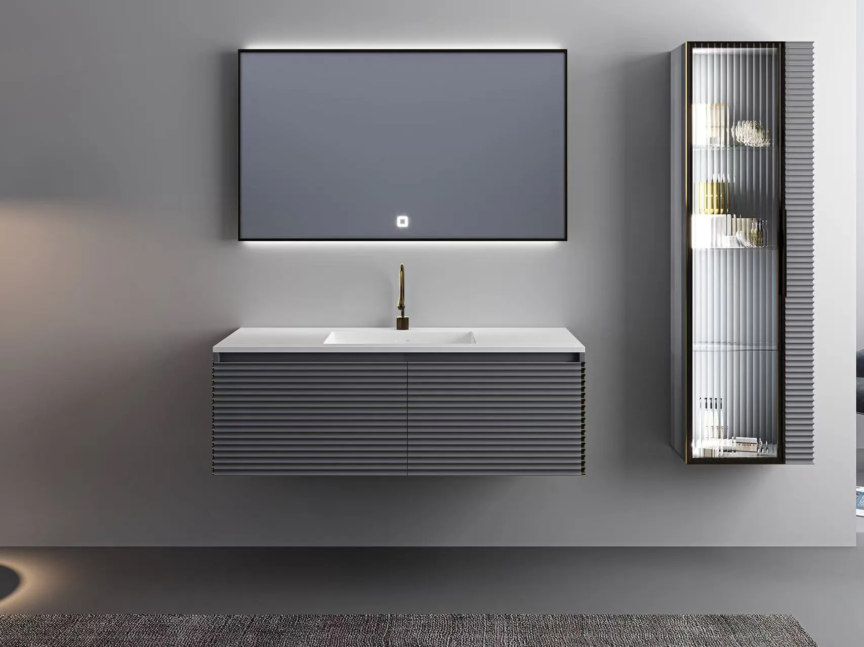 Centered solid surface vanity sink installed on a grey fluted floating cabinet with a modern brass faucet