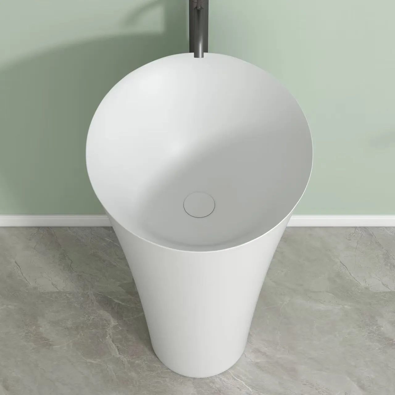 Freestanding round pedestal sink demonstrating HONDAO's OEM customization capabilities for modern hospitality environments.