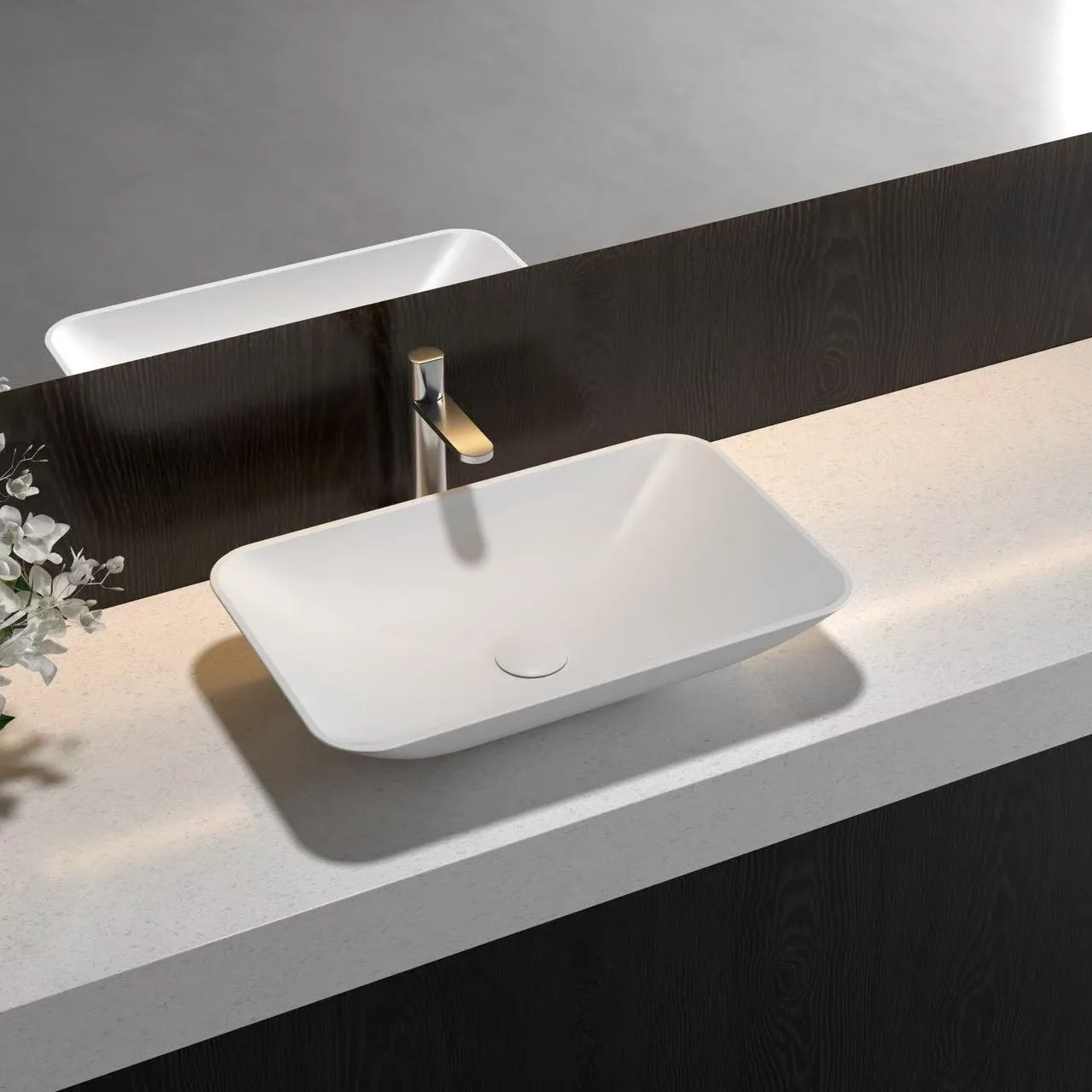 Minimalist oval Solid Surface Bathtub specified for high-end boutique hotel blueprints in natural lighting.