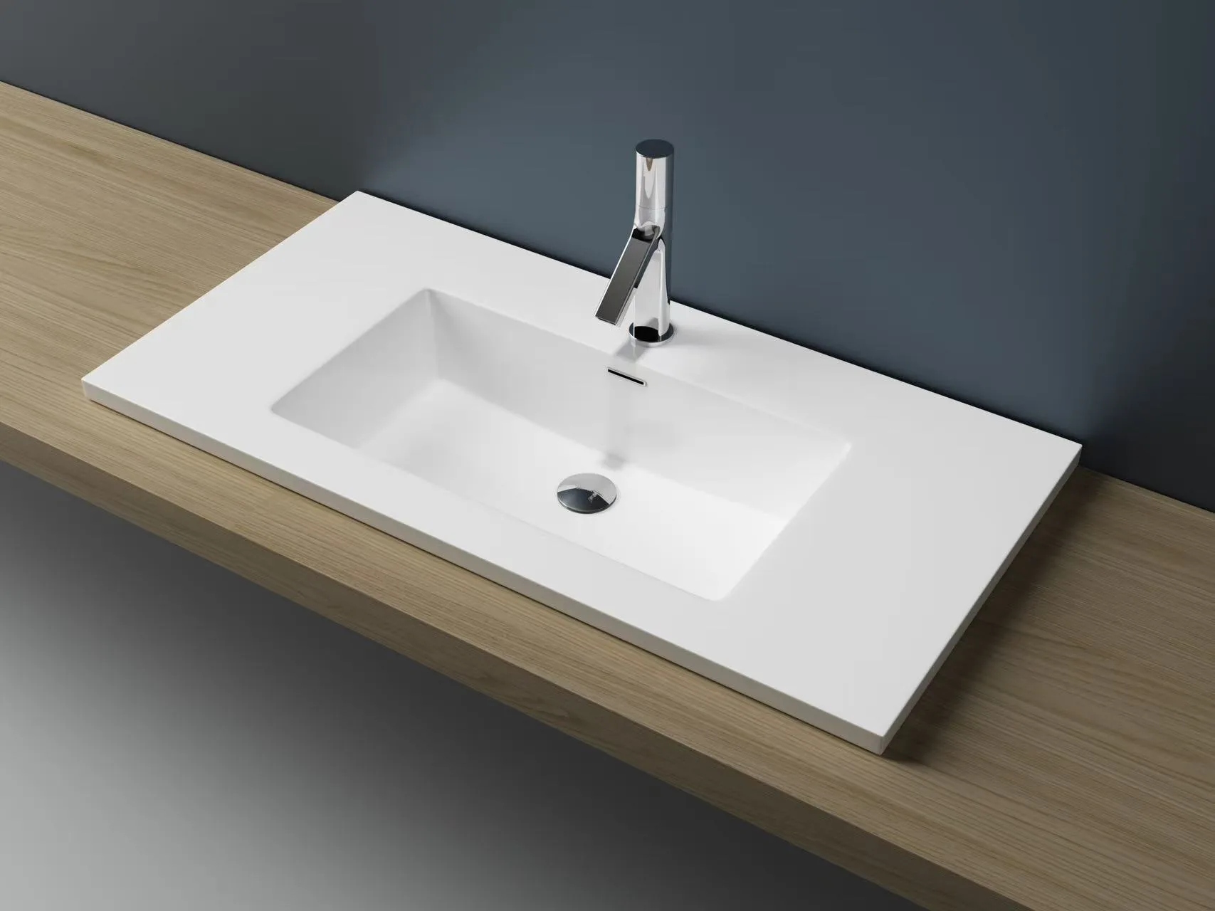 Minimalist rectangular solid surface vanity sink with a 20mm edge profile, designed for commercial hospitality projects.