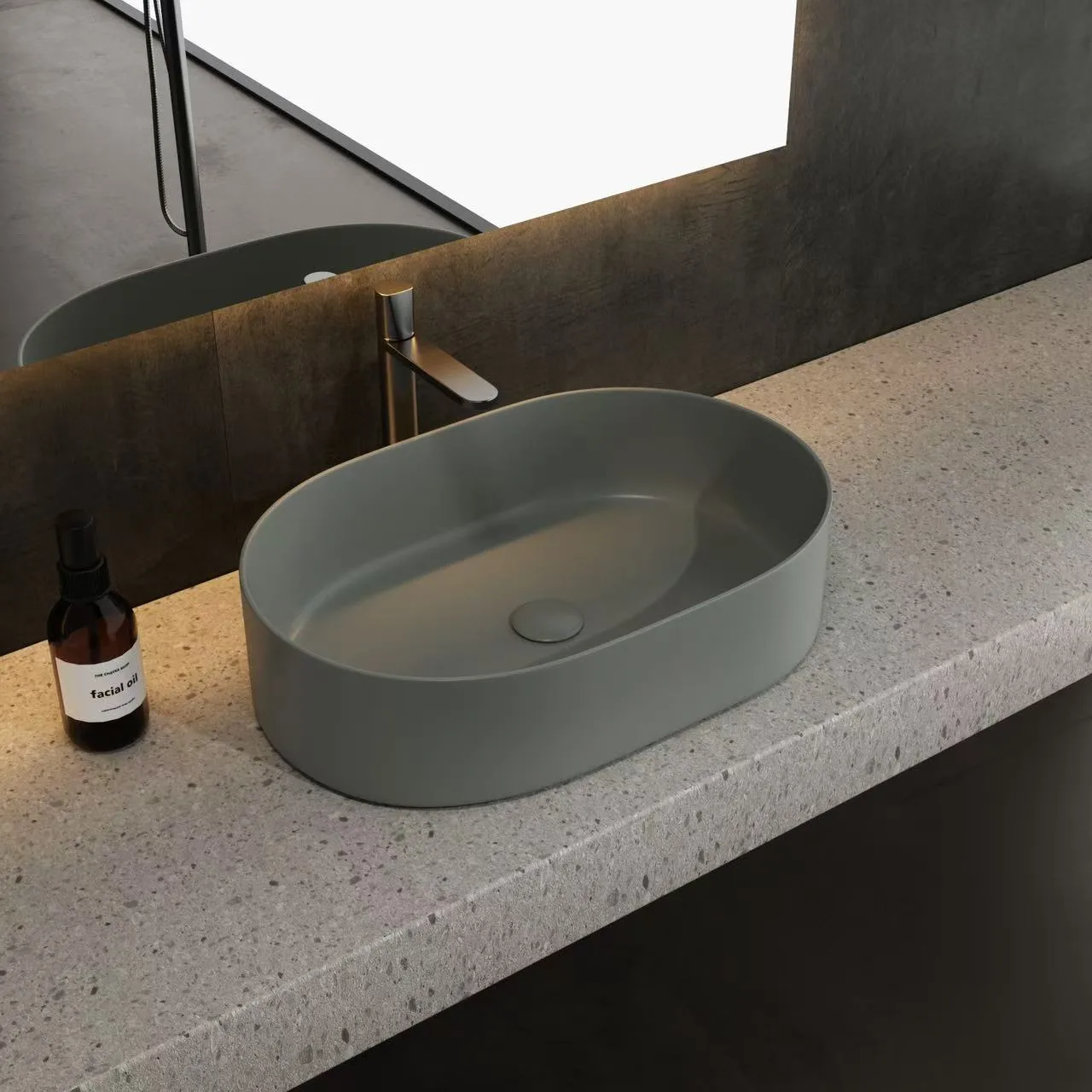 Minimalist grey solid surface vessel sink resting seamlessly on a custom hospitality cabinet.