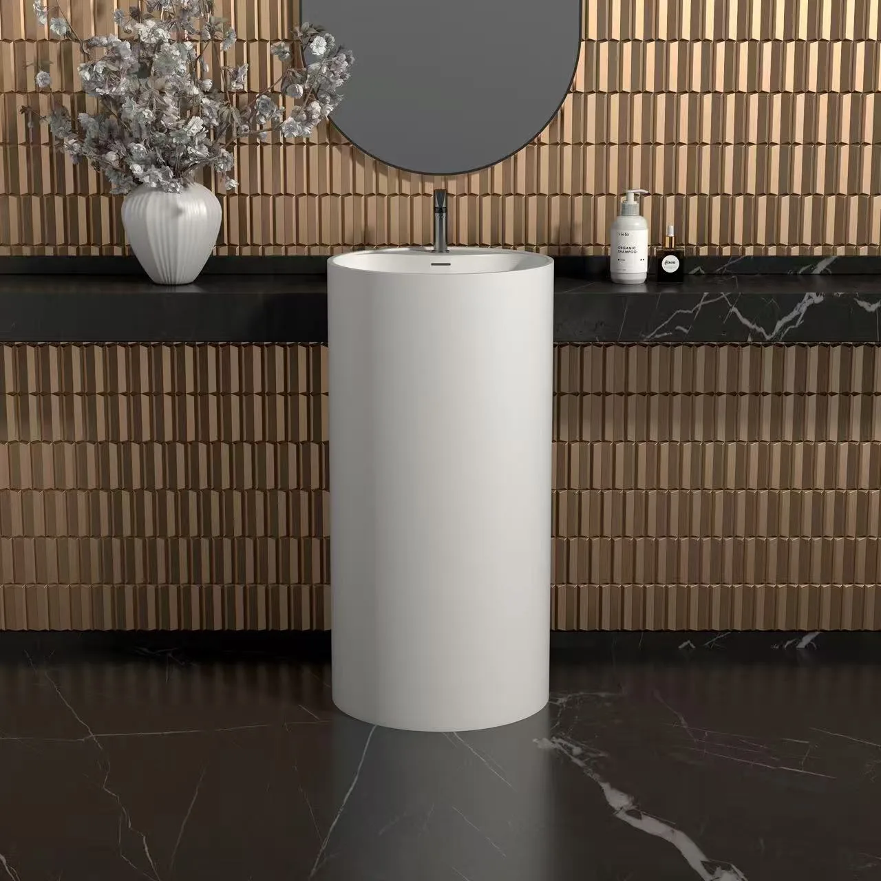 Matte white modern pedestal sink complementing a commercial vanity setting in a high-end hospitality environment.