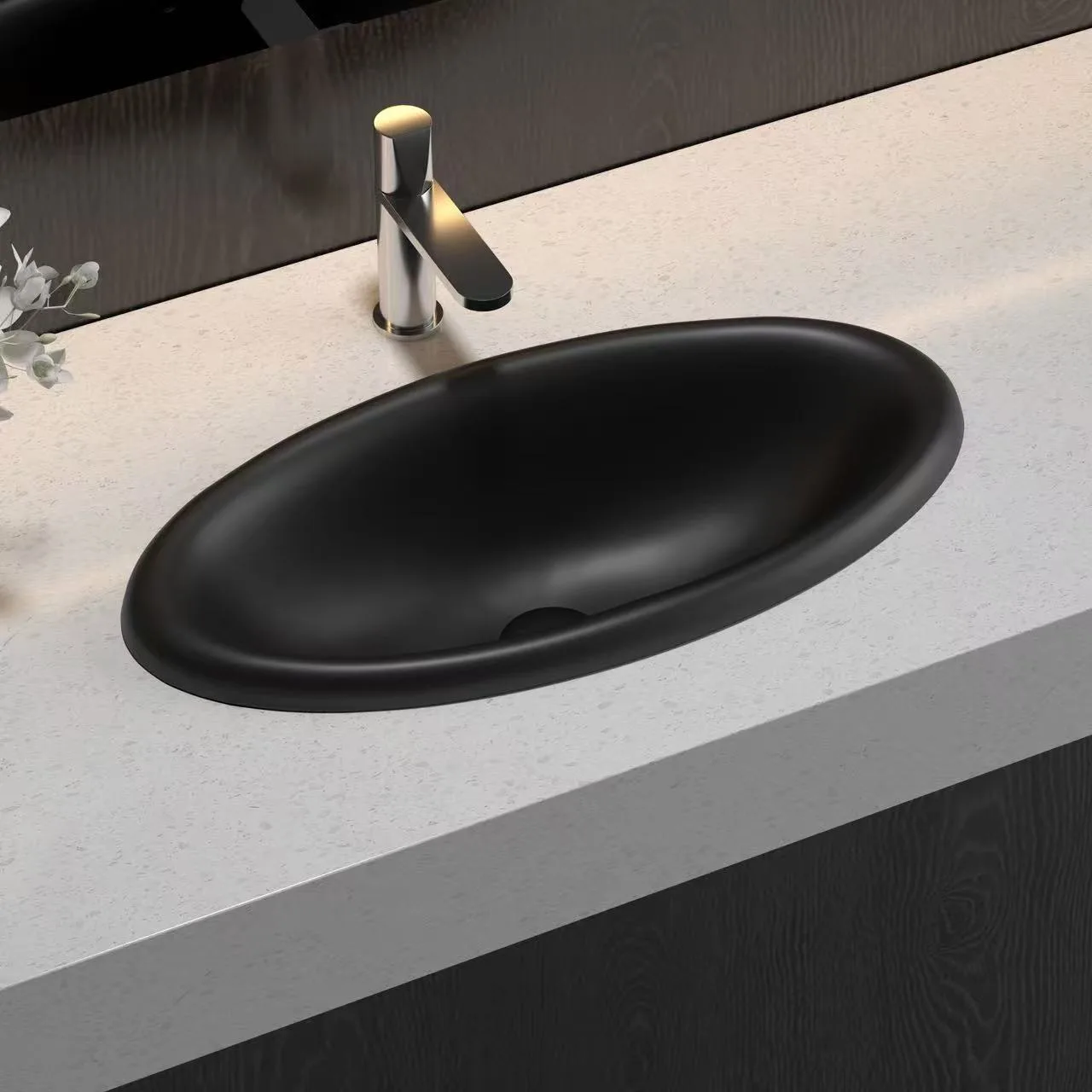 Integrated Rectangular Undermount Solid Surface Sink creating a seamless countertop surface on a modern hospitality vanity cabinet.