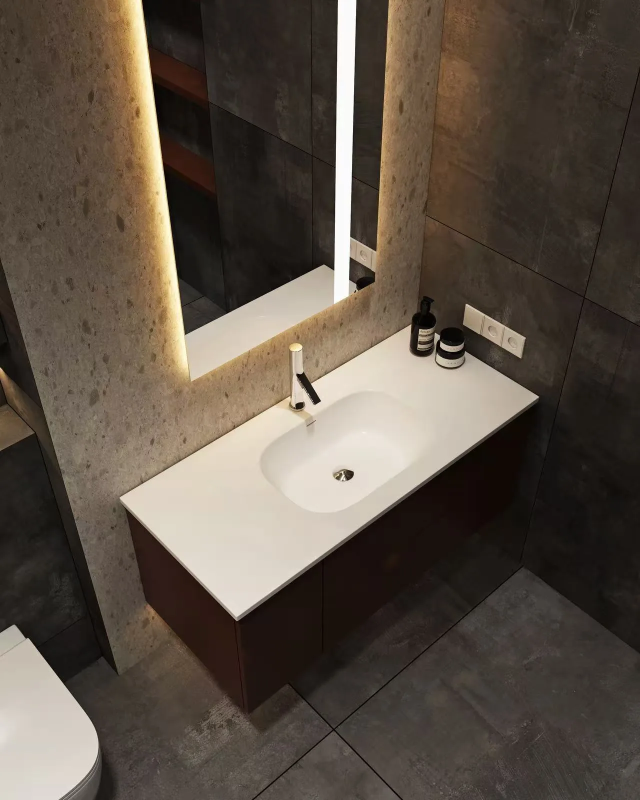 Modern Integrated Solid Surface Offset Oval Basin on dark wood vanity