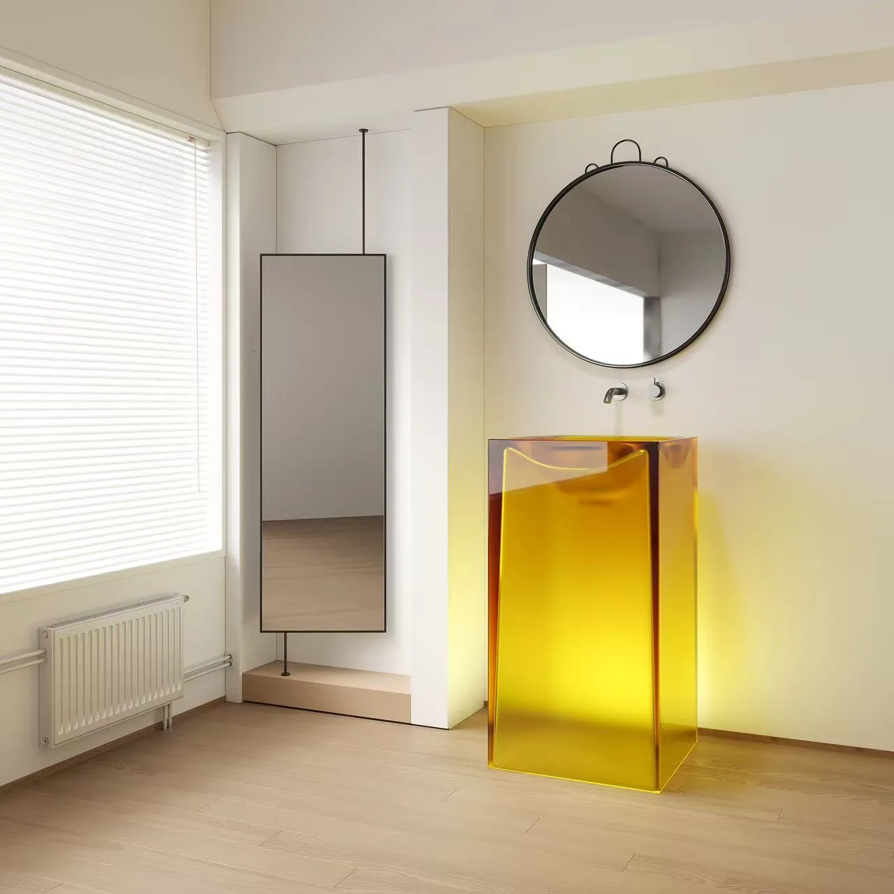 Monolithic translucent square resin pedestal sink engineered for high impact resistance and brilliant light refraction.
