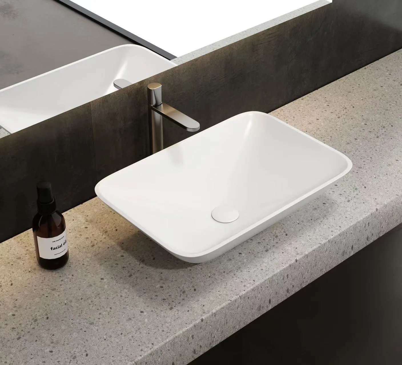 Integrated Solid Surface Bathtub installed in a cohesive wet zone design next to a natural stone natural vanity.
