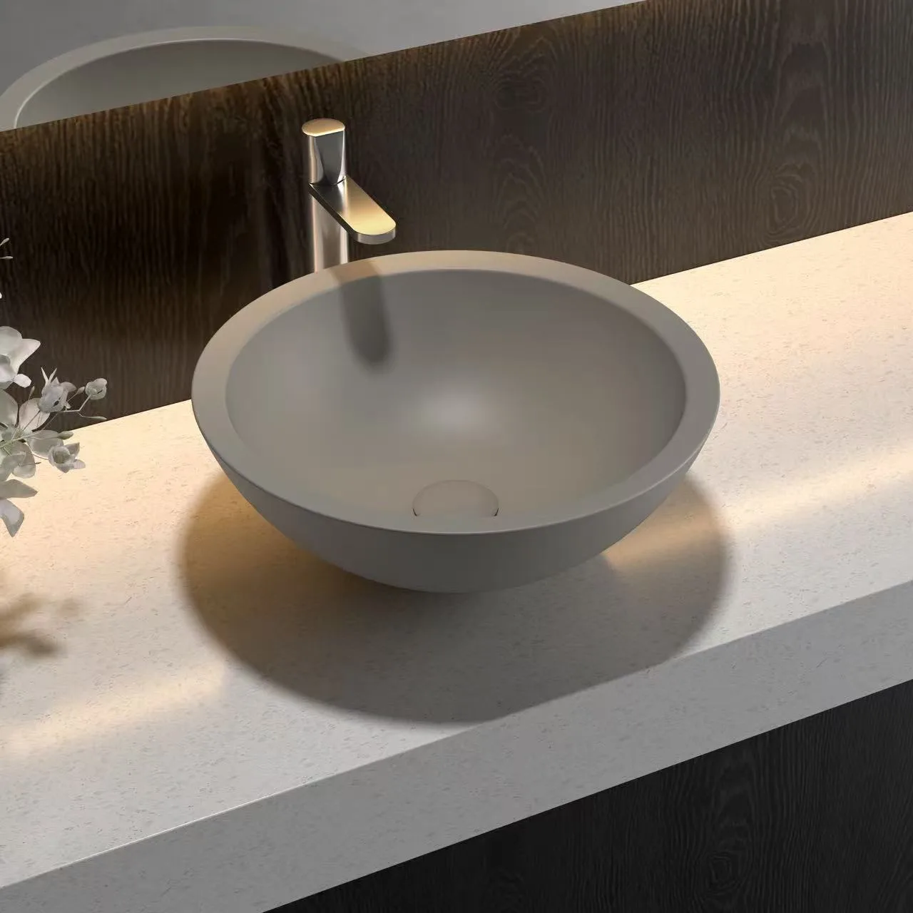 Minimalist light grey Round Solid Surface Vessel Sink engineered for high impact resistance in hospitality restrooms.