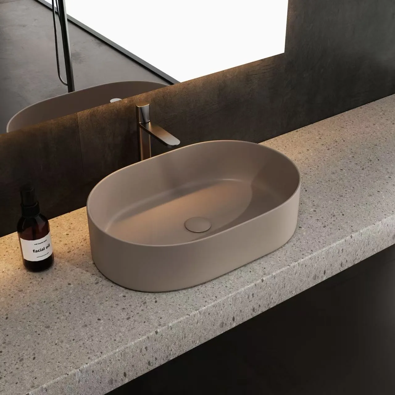 Dark grey solid surface vessel sink showcasing an elegant oval architectural profile for commercial spaces.