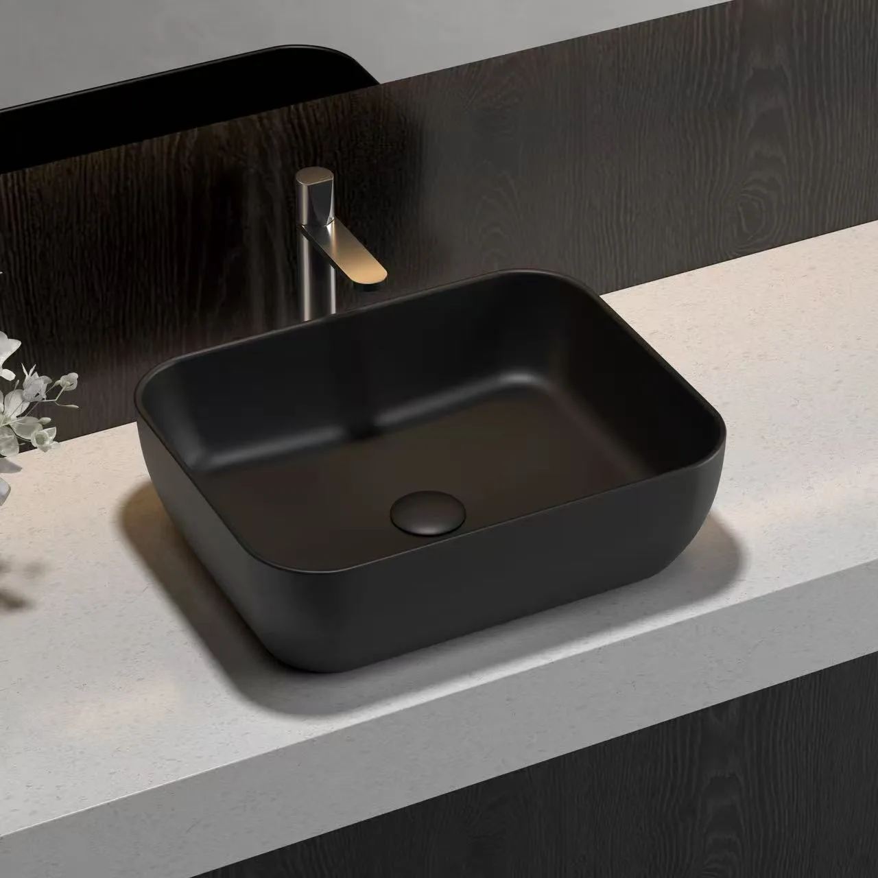 Matte black Rectangular Vessel Solid Surface Sink designed to resist fading and deep cosmetic staining in high-traffic