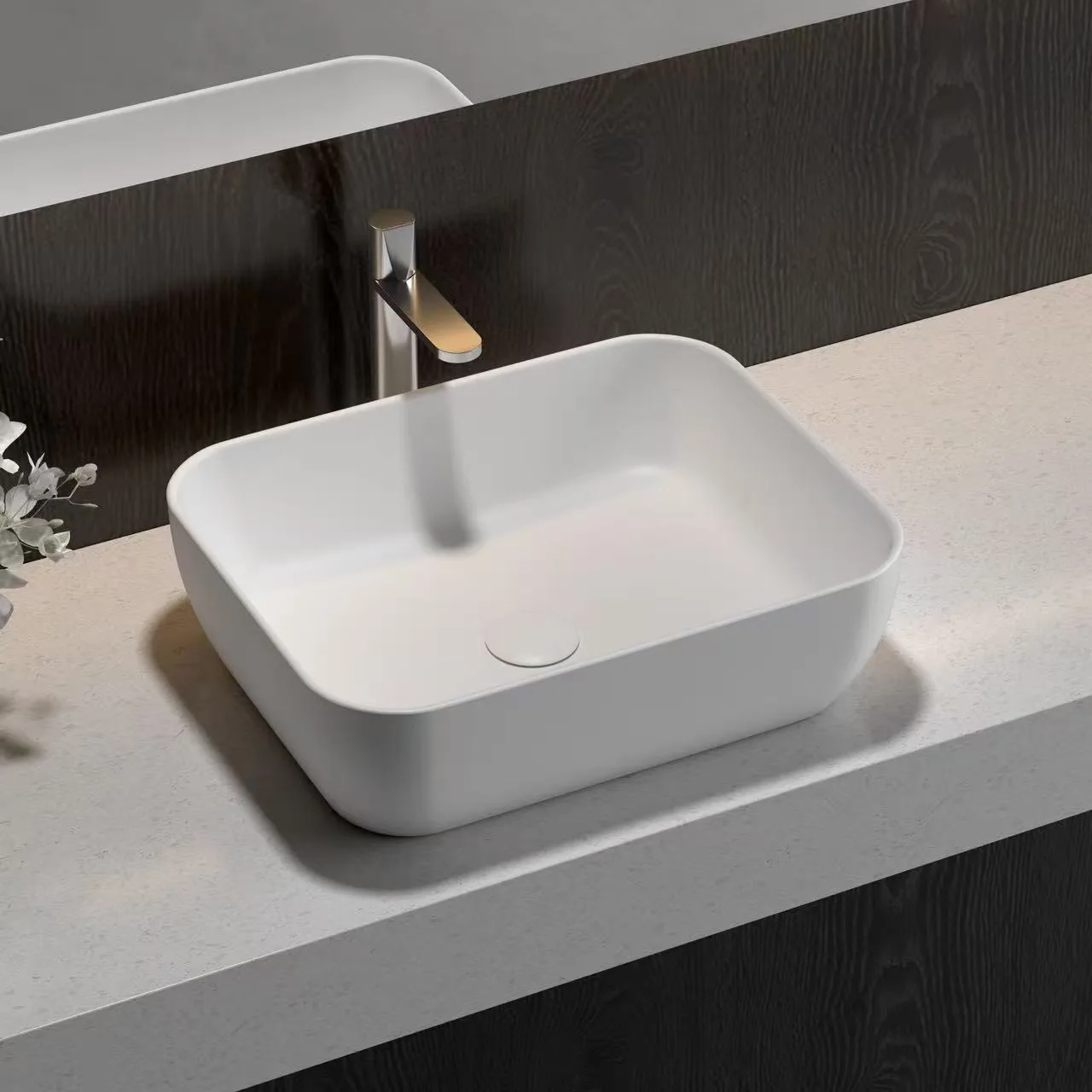 Classic matte white Rectangular Vessel Solid Surface Sink providing a durable, monolithic design for modern commercial restrooms.