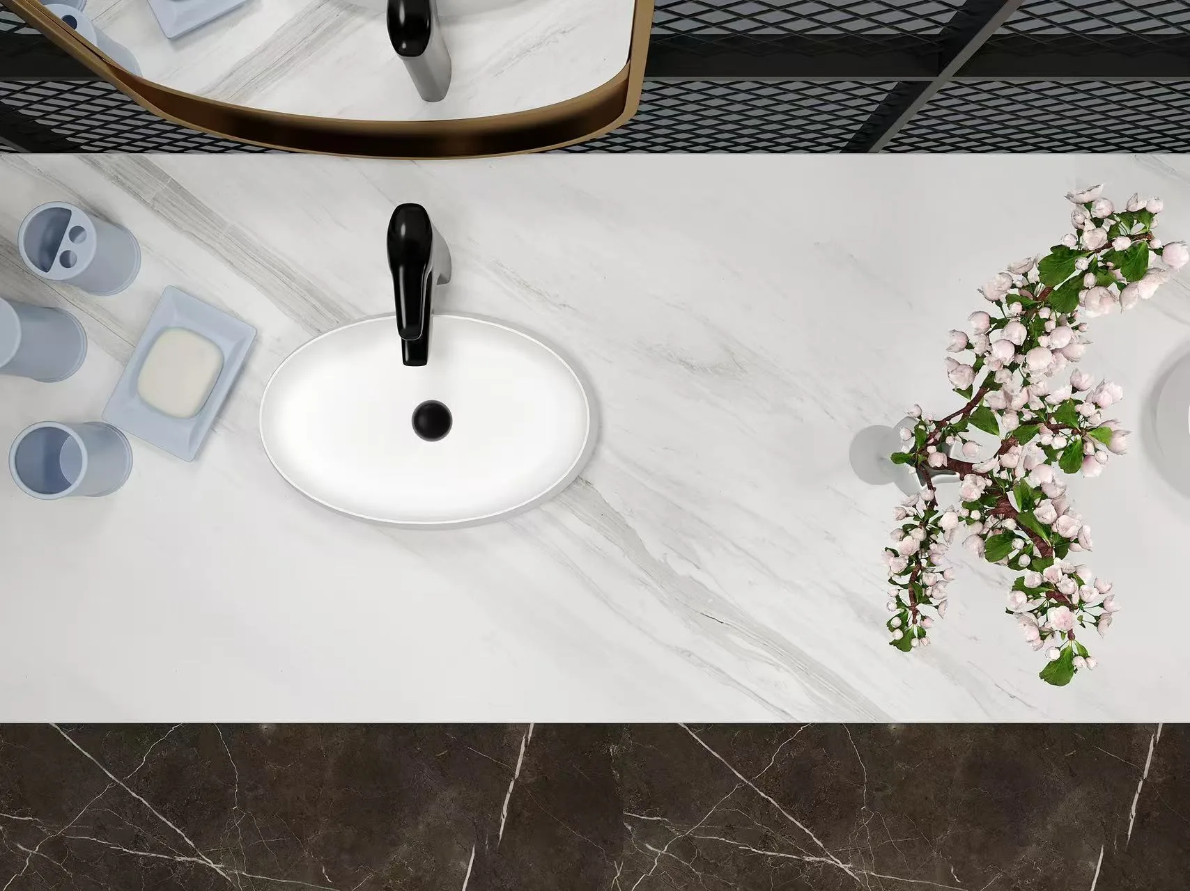 Top-down view of a matte white solid surface oval vessel sink installed on a luxury marble vanity countertop.