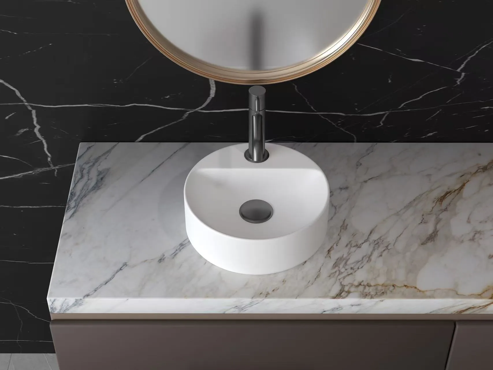 Top-down view of a matte white solid surface round vessel sink with an integrated rear faucet deck on a marble countertop.