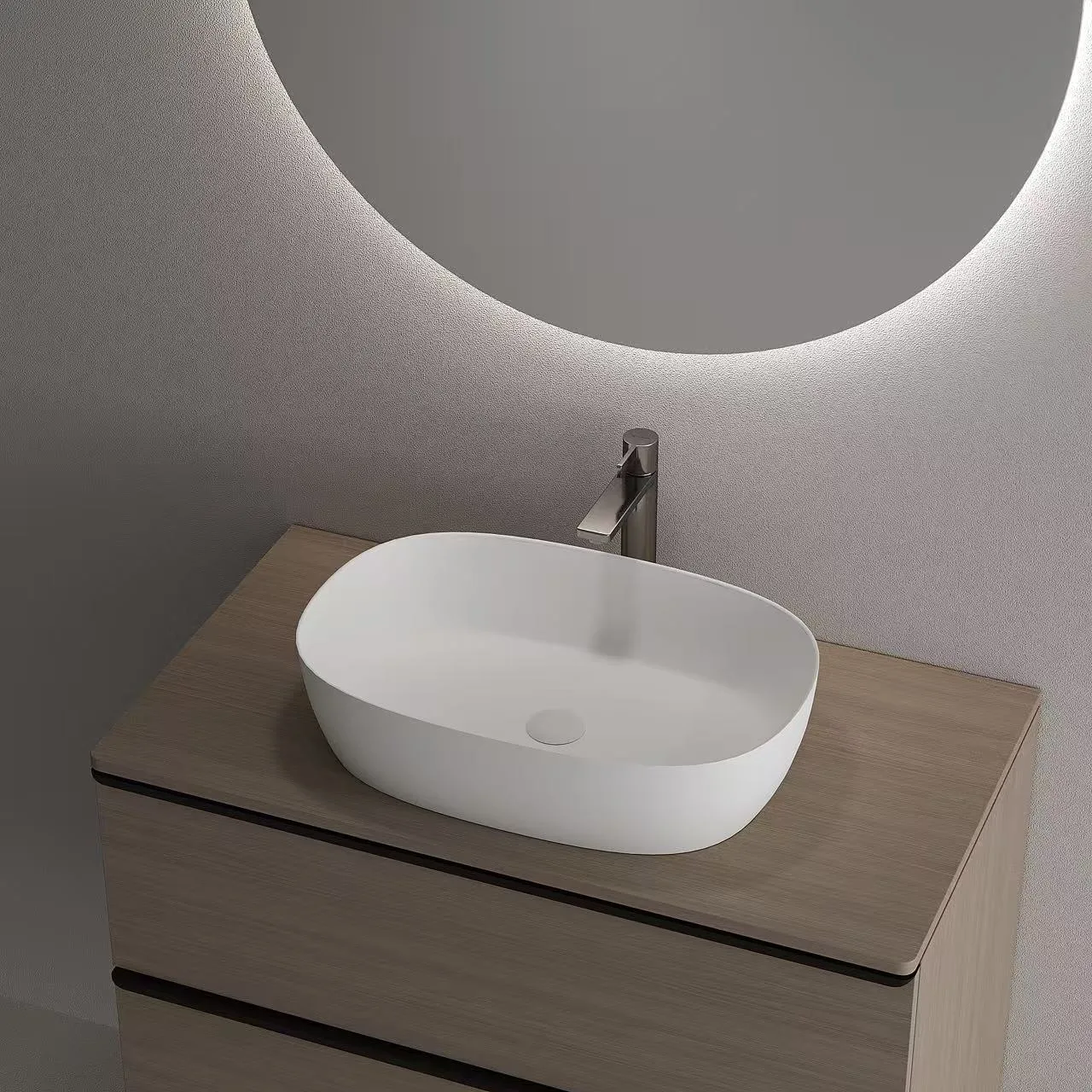 Top-down architectural angle of the Matte Solid Surface Vessel Sink paired with a modern chrome faucet.