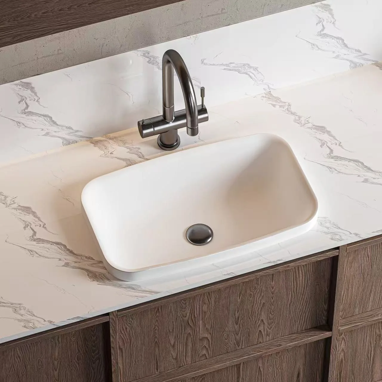 Matte white Solid Surface Rectangular Basin paired with a dark faucet in a luxury hospitality washroom.