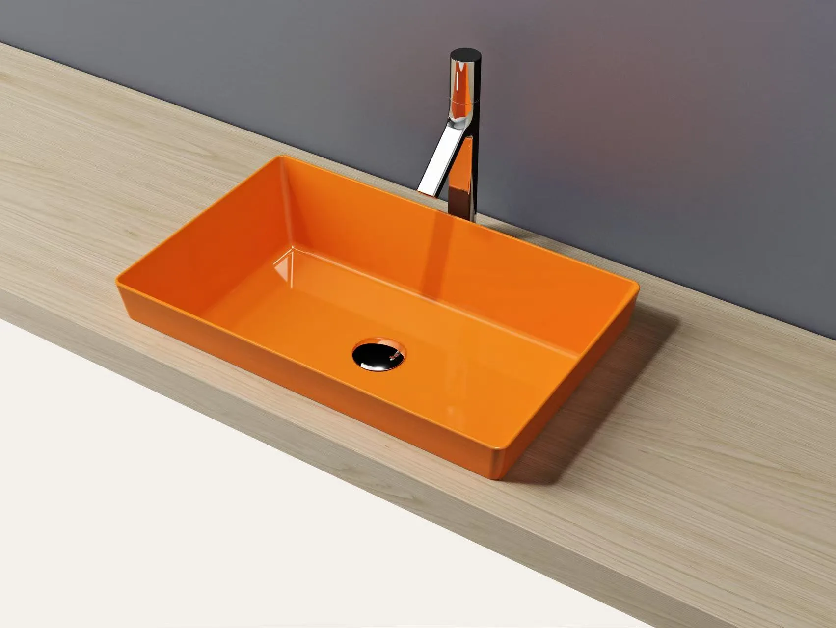 Vibrant orange solid surface thin-edge vessel sink acting as a colorful architectural focal point in a luxury bathroom.