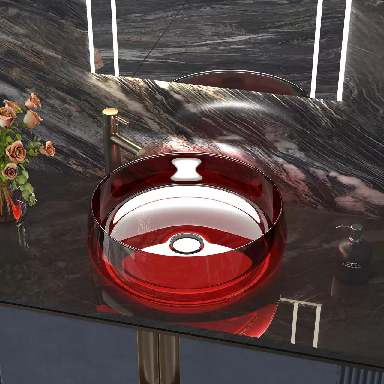 Luxury hotel vanity installation featuring a ruby red round glass vessel bathroom sink on a premium dark marble countertop.
