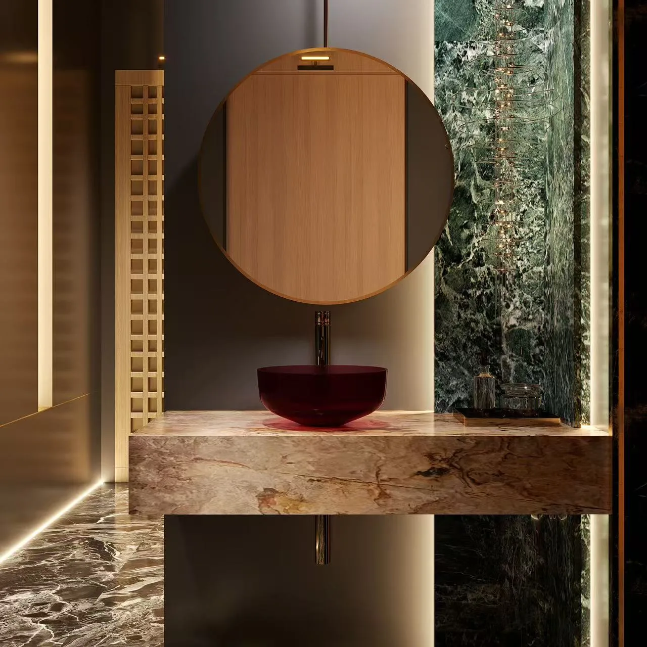 Luxury commercial washroom vanity presenting a deep ruby red round translucent glass vessel countertop sink.