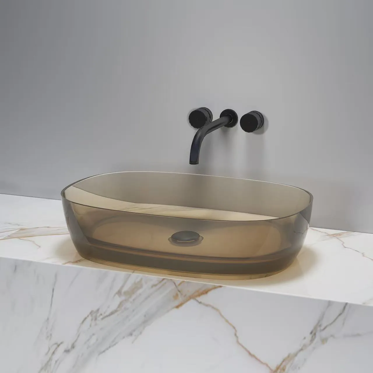 Contemporary vanity featuring rectangular blue colored glass bathroom vessel sinks.