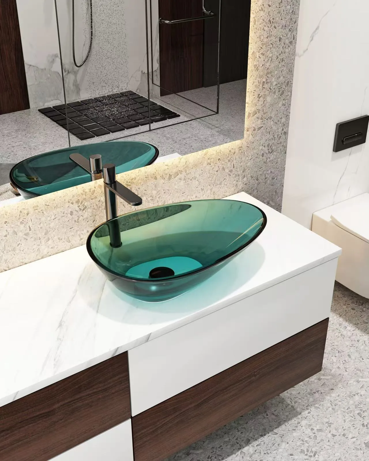 Premium boutique hotel vanity decorated with emerald green colored glass vessel bathroom basins.