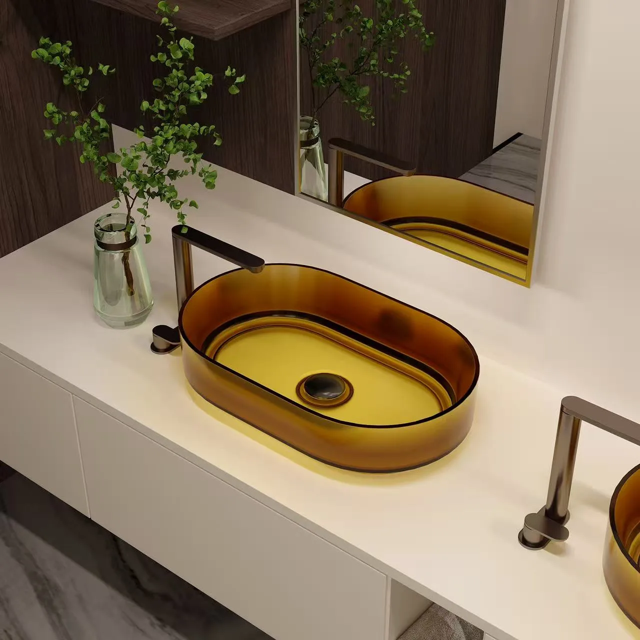 Overhead perspective highlighting the deep translucent glow and sleek polished curves of the amber glass vessel bathroom sinks.
