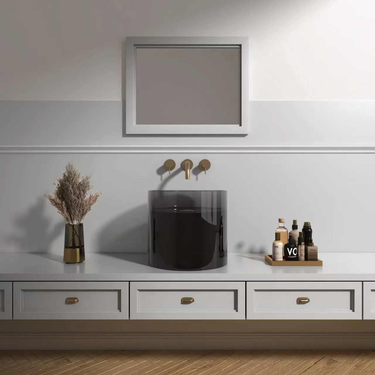 Elegant bathroom vanity installation featuring a warm amber cylindrical glass vessel bathroom basin with a wall-mounted brass faucet.