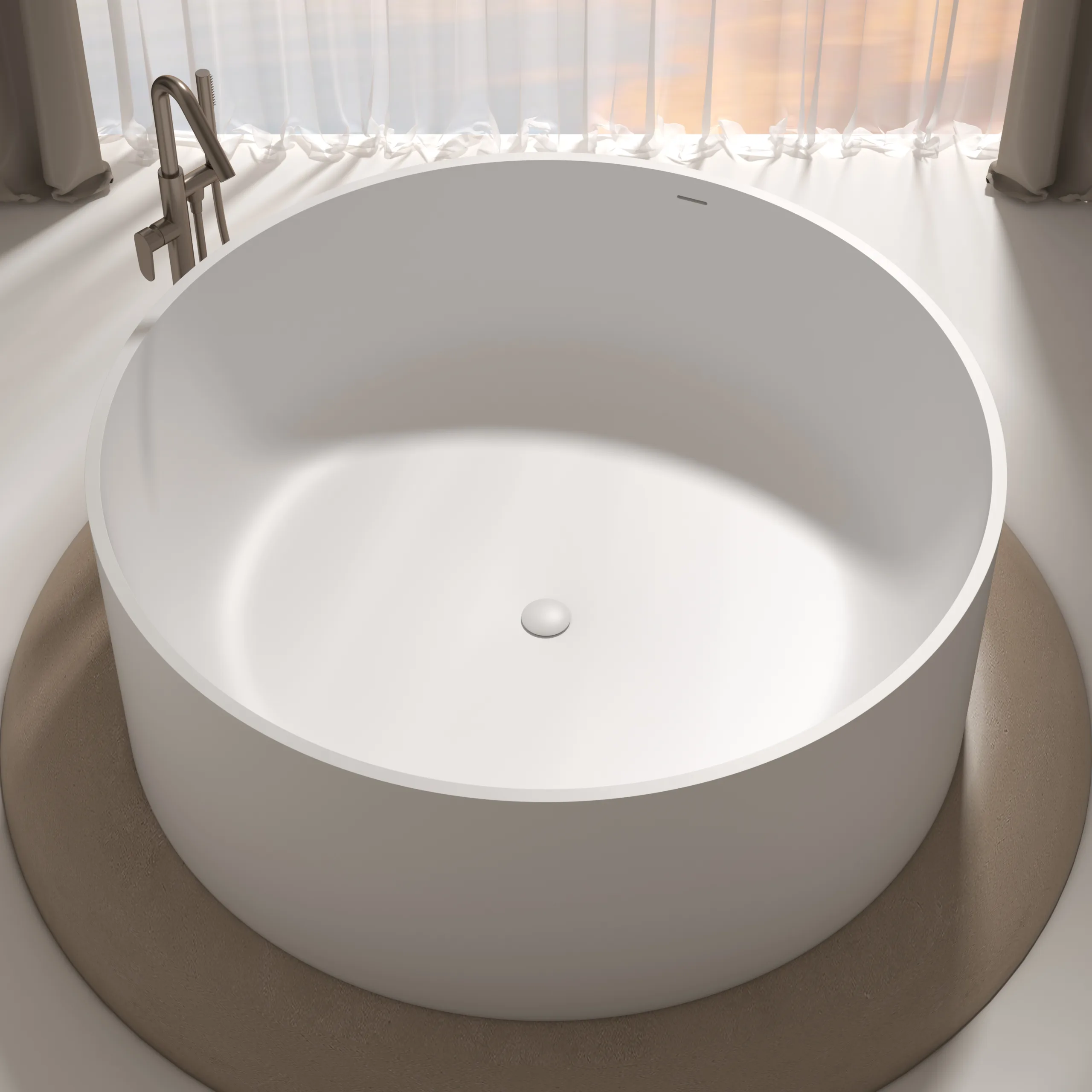 Eye-level straight-on view of a premium matte white round solid surface freestanding bathtub centered in front of a luxury floor-to-ceiling window setup.