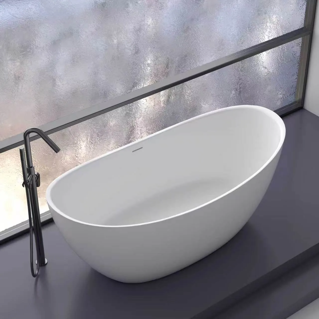 High-angle perspective view of the Matte White Curved Freestanding Solid Surface Bathtub positioned beside a floor-to-ceiling glass wall next to a matte black floor-mounted tub filler.