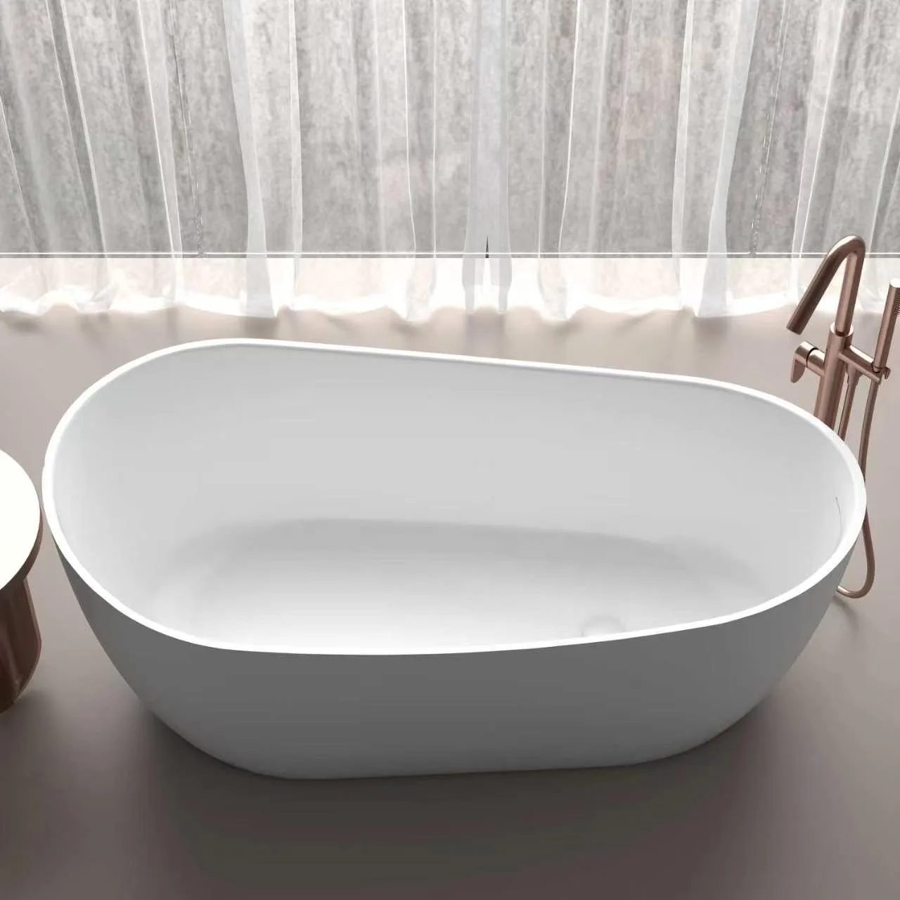 High-angle perspective view of the Matte White Asymmetric Freestanding Solid Surface Bathtub set against sheer curtains with a brushed rose gold floor-mounted tub filler.