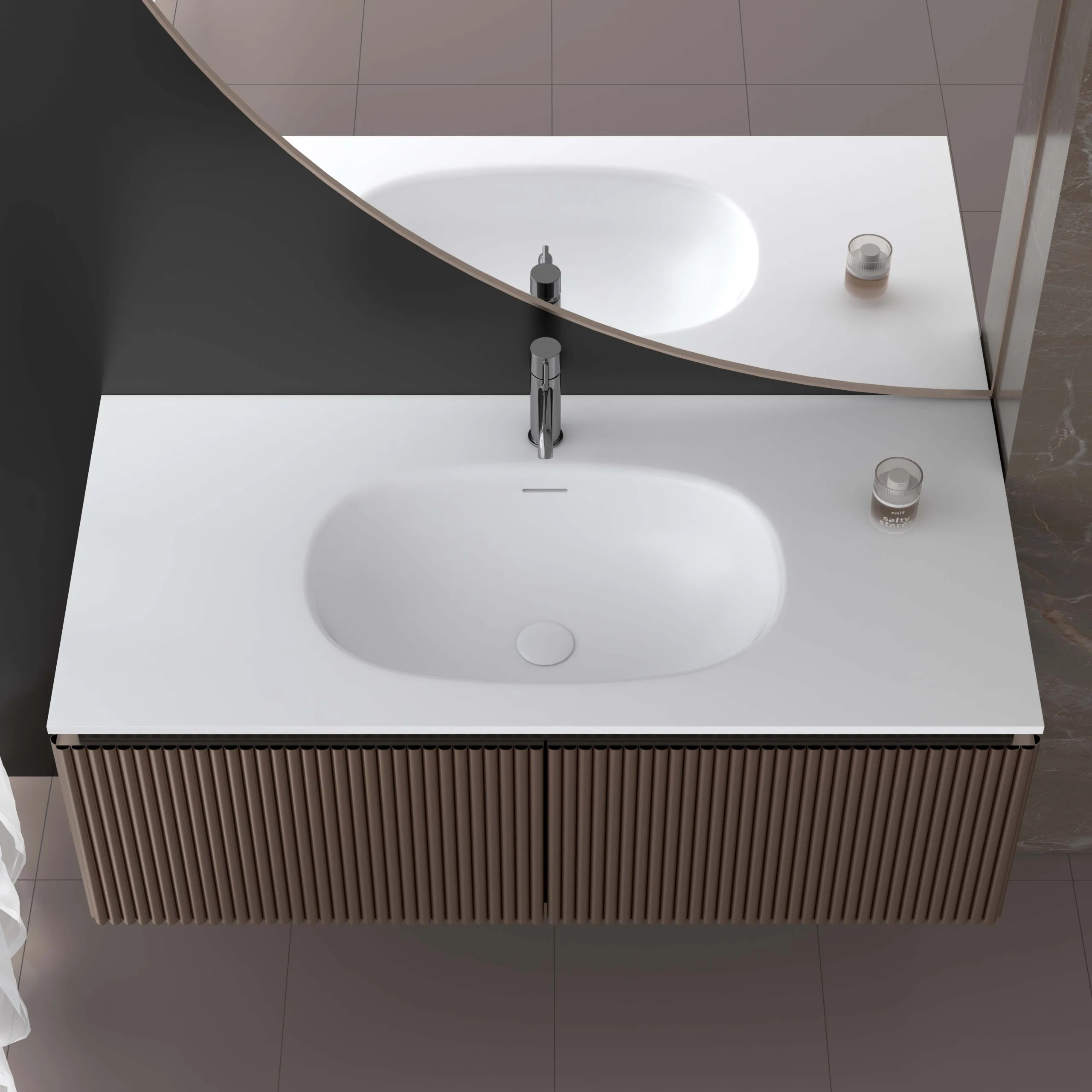 Top-down perspective view of the brown fluted floating solid surface bathroom vanity showcasing the smooth oval basin cutout and uniform slatted cabinet facade.