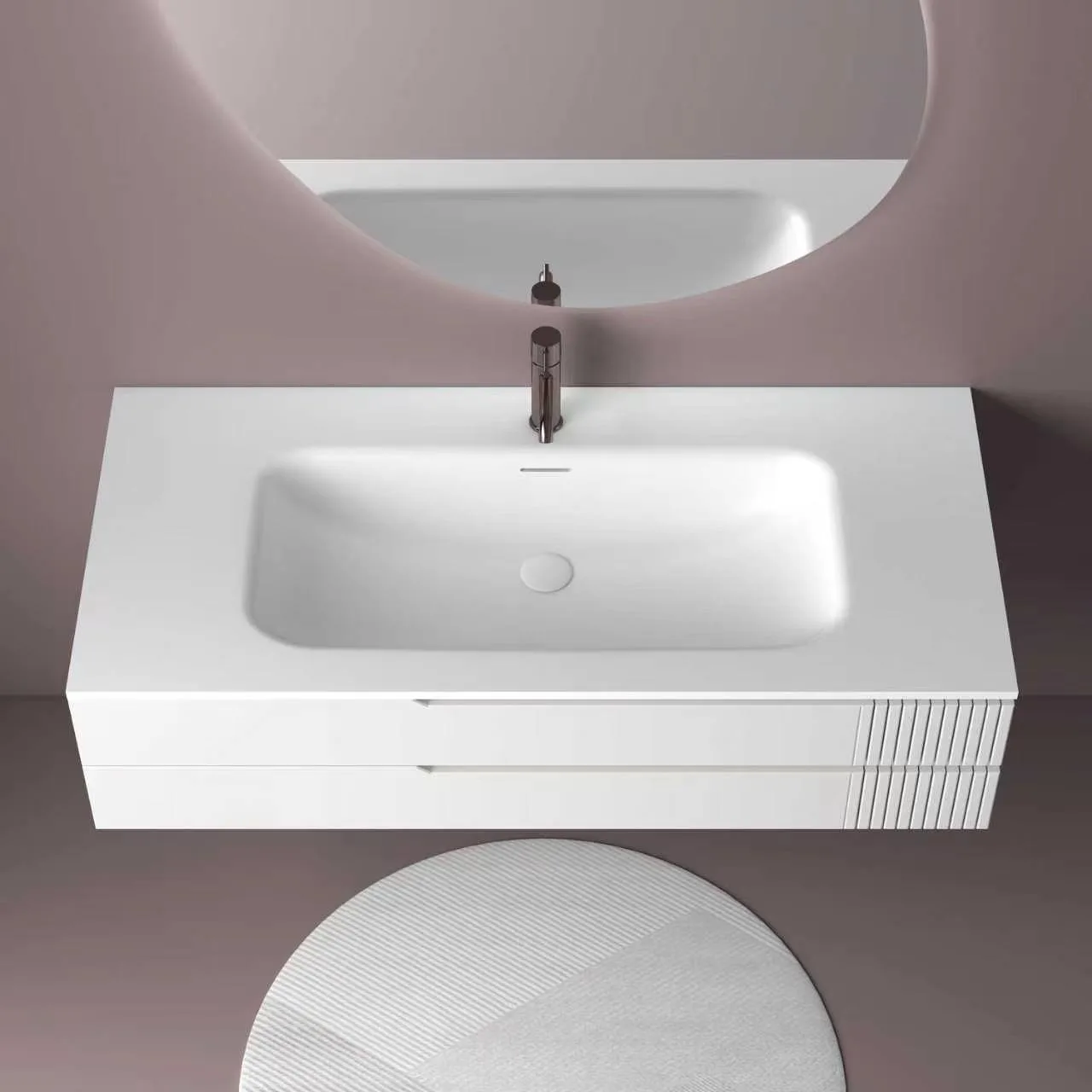 Direct overhead top-down view of the white fluted floating solid surface bathroom vanity showcasing the smooth integrated rectangular basin and spacious counter deck.