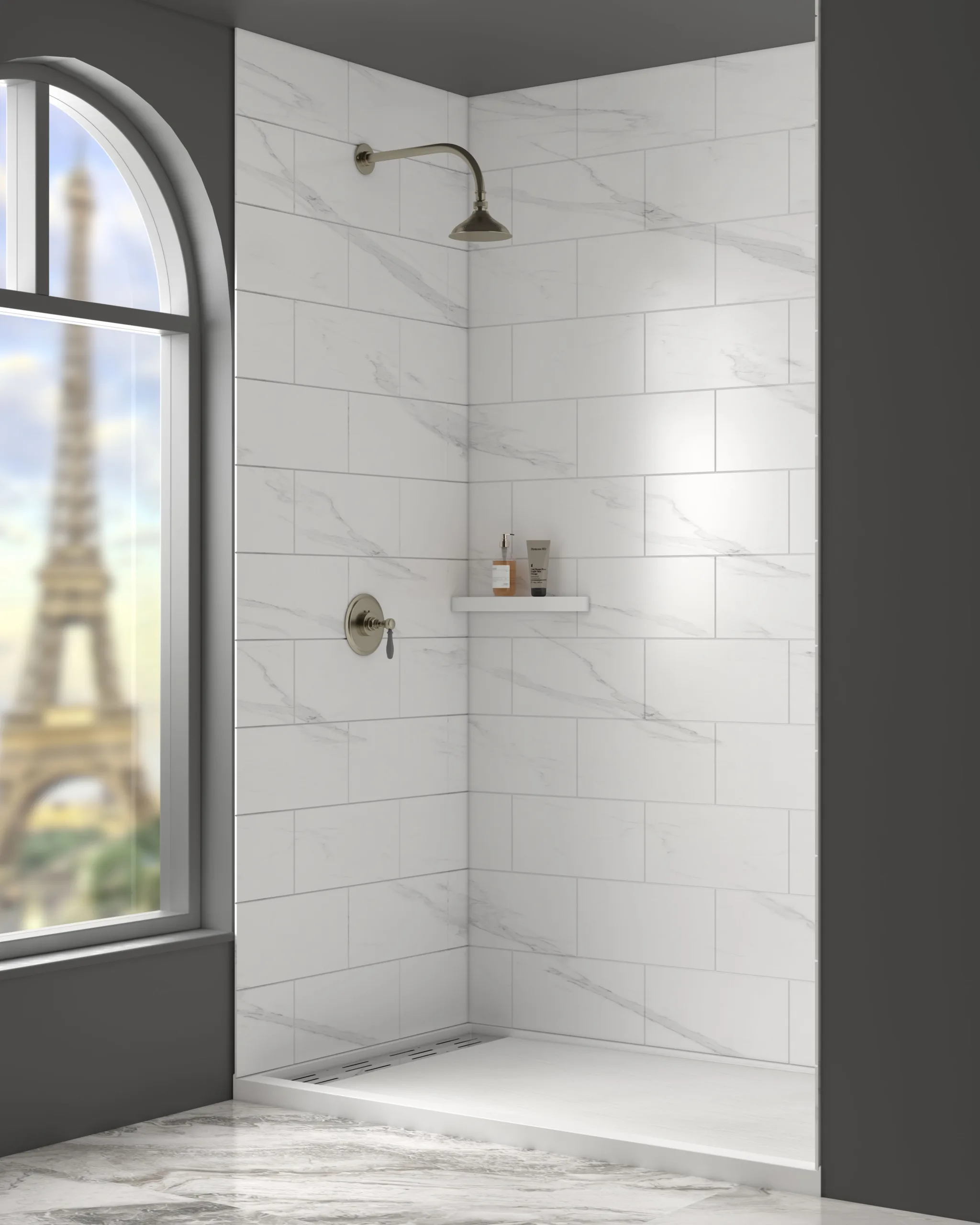 Classic walk-in hospitality shower alcove showcasing white marble subway tile cultured marble shower panels paired with traditional brushed bronze fixtures.
