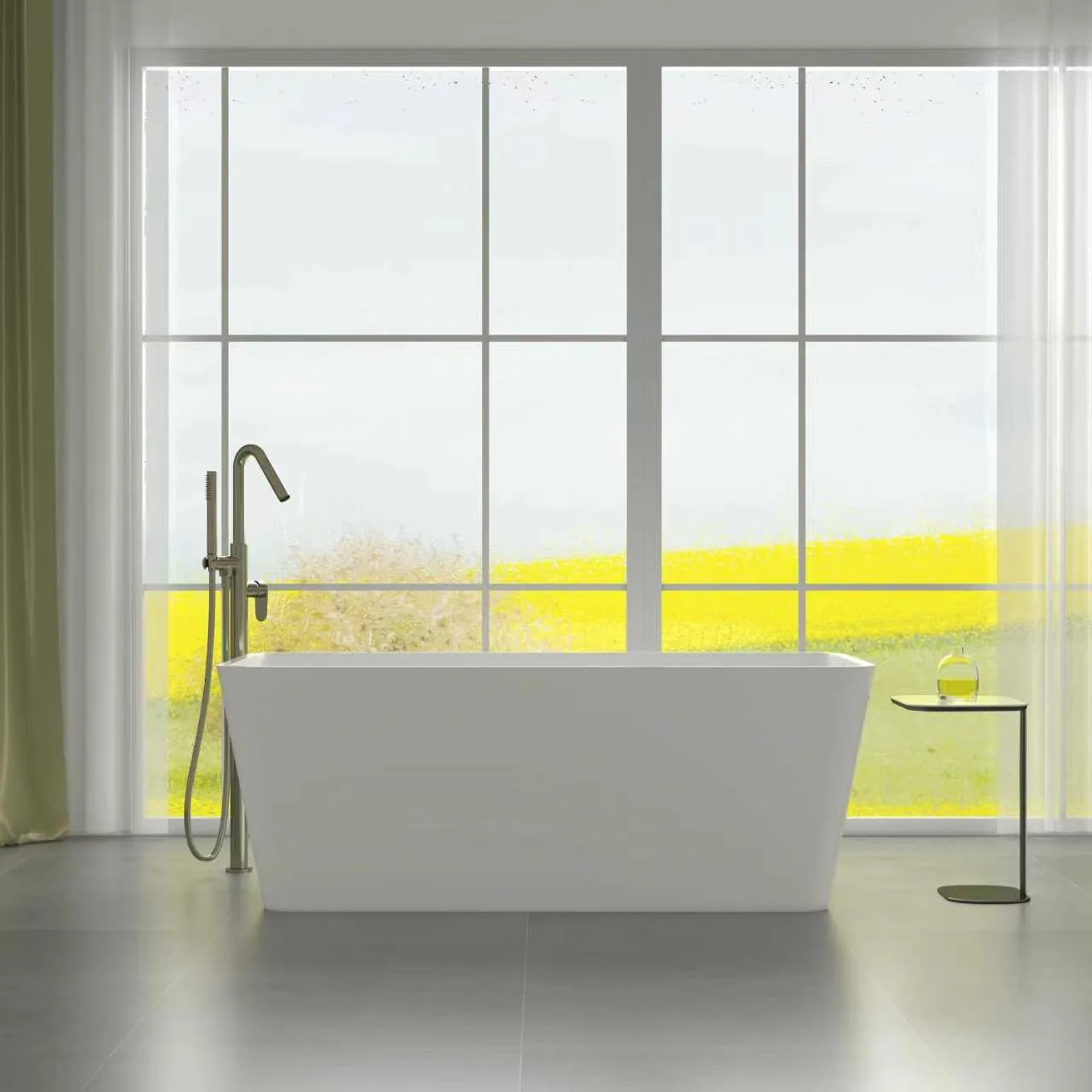 Three-quarter overhead high-angle view looking into the seamless basin and integrated linear overflow slot of the matte white tapered rectangular solid surface freestanding bathtub.
