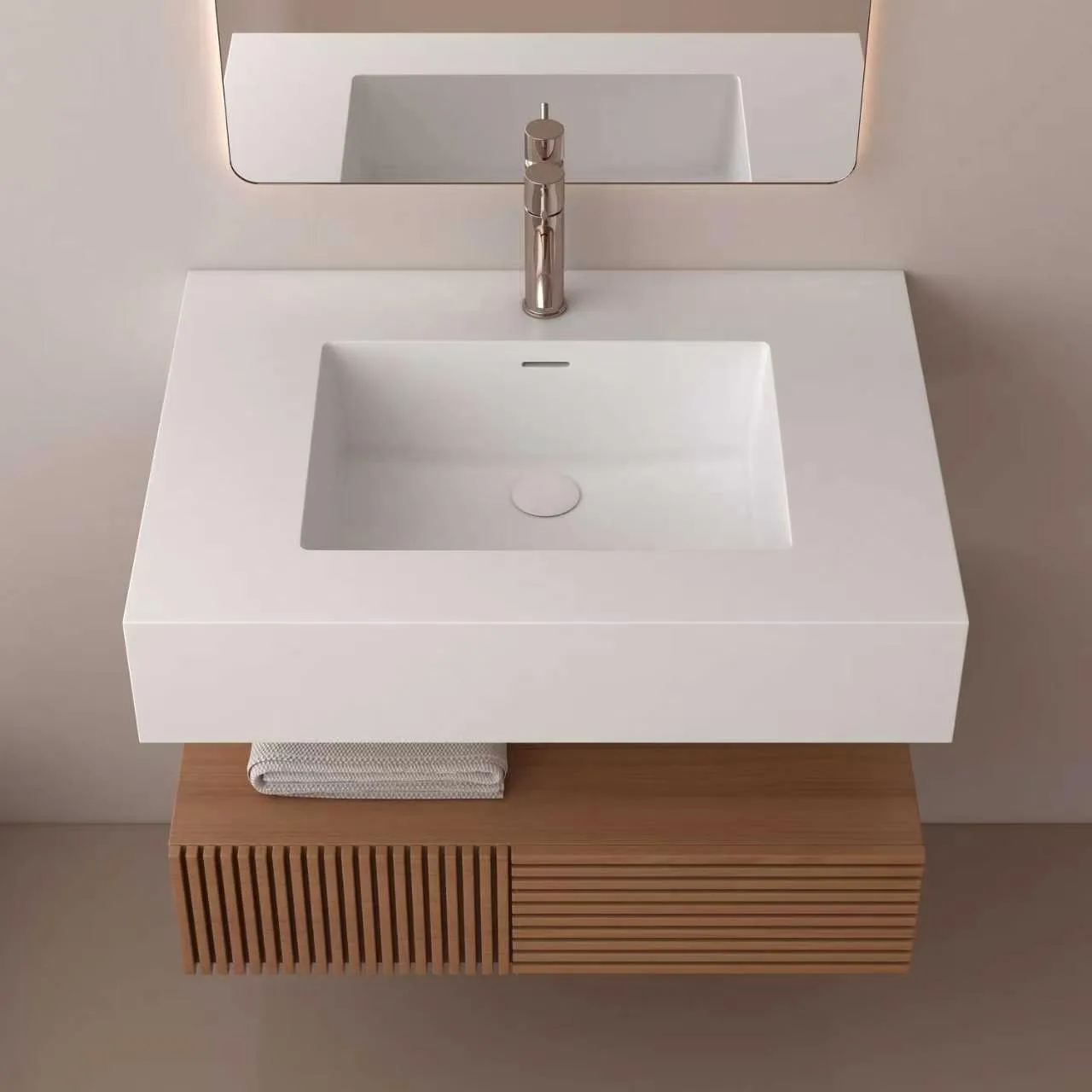 Direct overhead top-down view showcasing the seamless integrated rectangular basin and spacious counter deck of the oak fluted floating solid surface bathroom vanity.