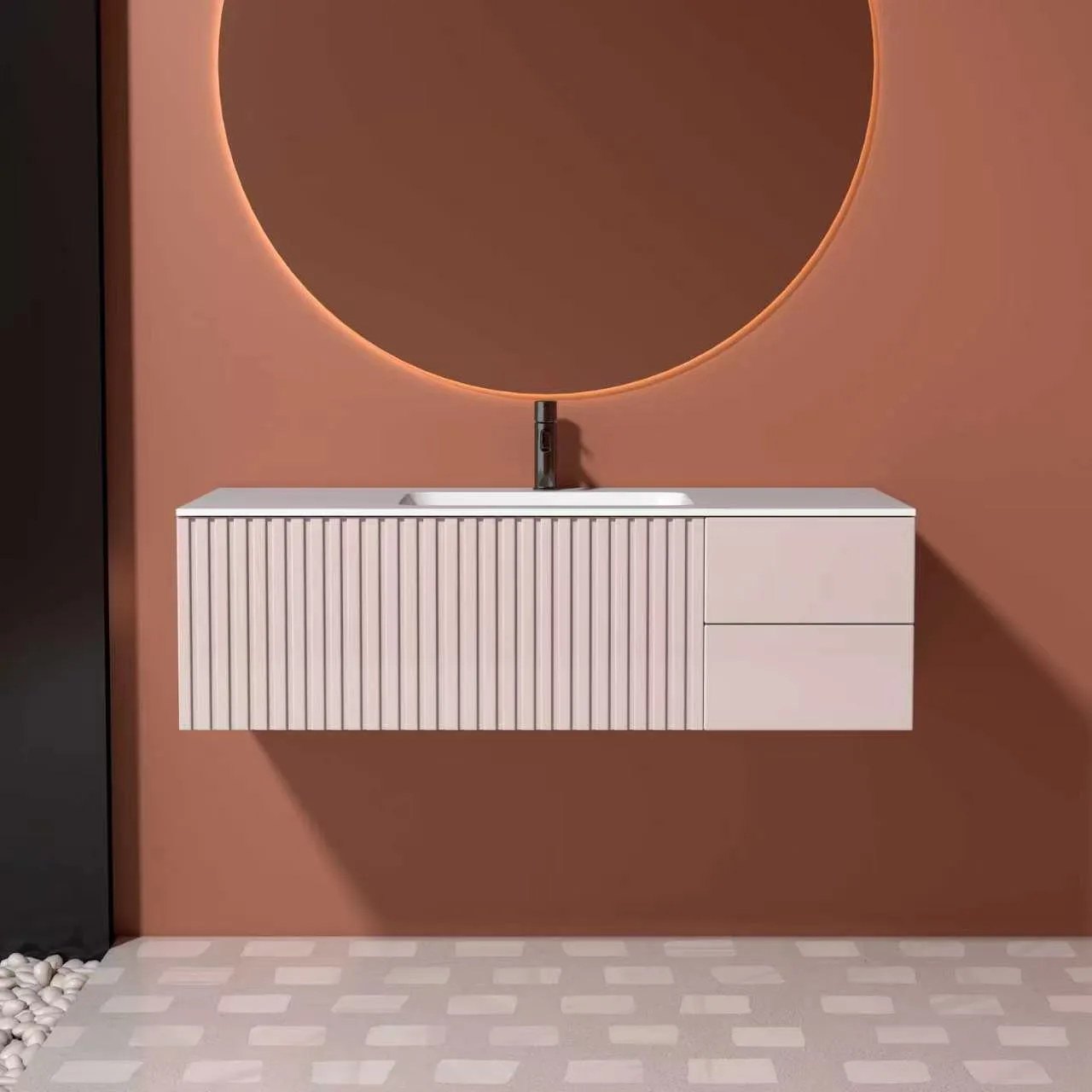 Front elevation view highlighting the minimalist lines, handleless drawers, and vertical slatted fluted paneling of the blush pink fluted floating solid surface bathroom vanity.