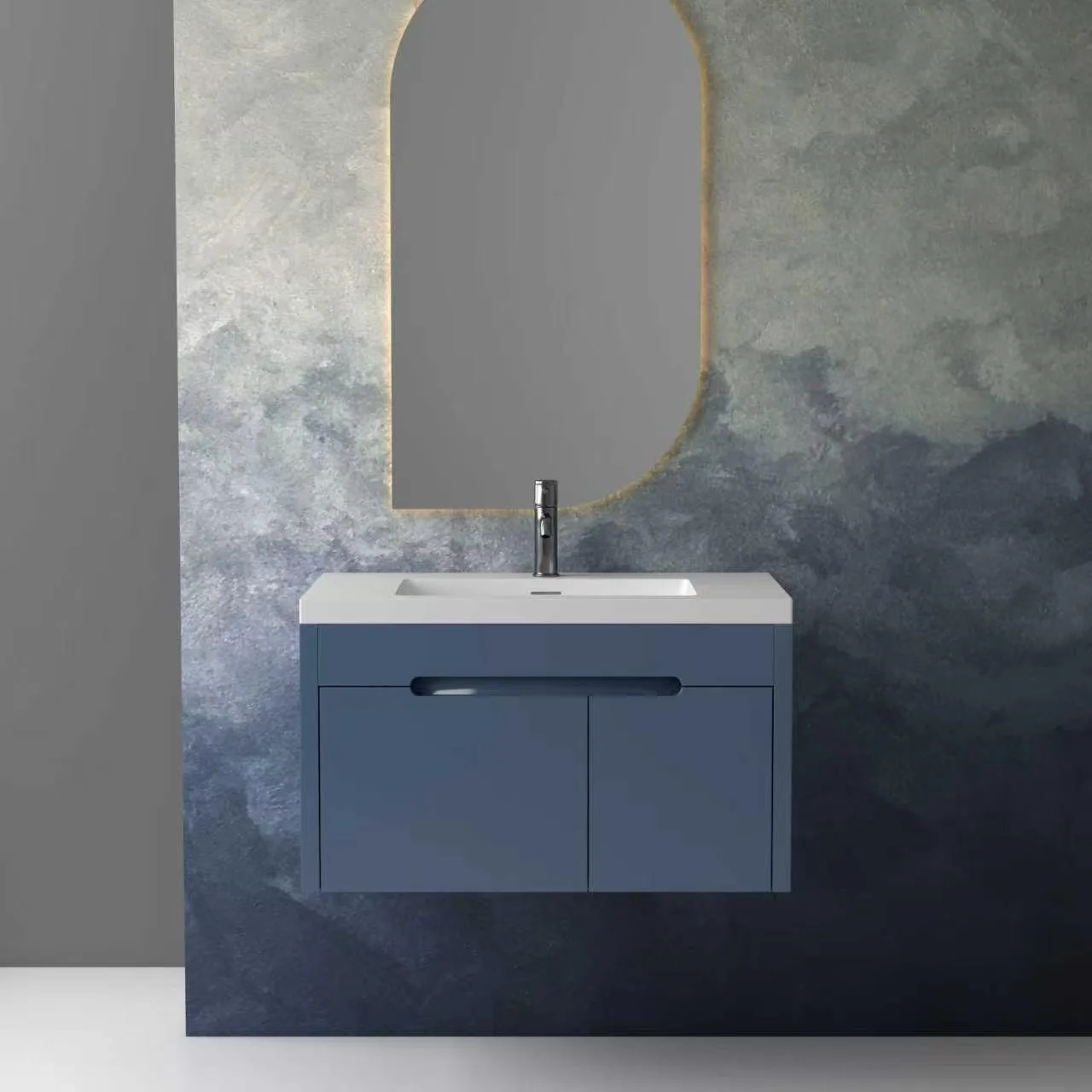 Front elevation view showcasing the clean minimalist lines, integrated recessed handle groove, and architectural symmetry of the slate blue floating solid surface bathroom vanity.