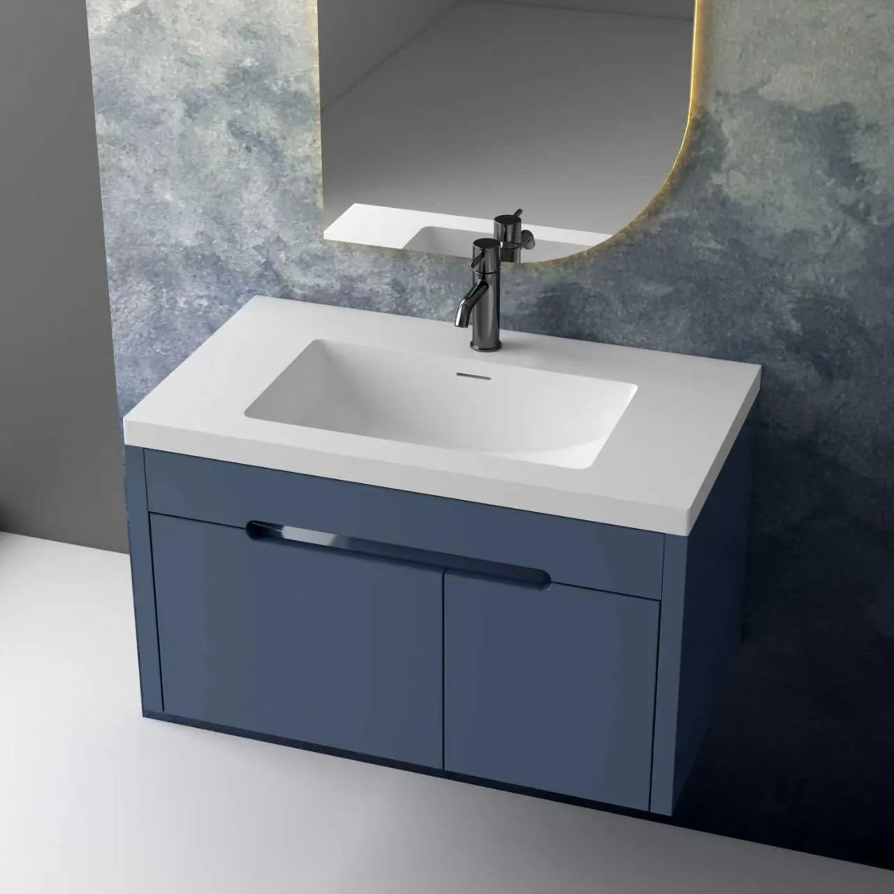 Perspective view illustrating the modern wall-mounted configuration of the slate blue floating solid surface bathroom vanity system set against a textured blue artistic background wall.