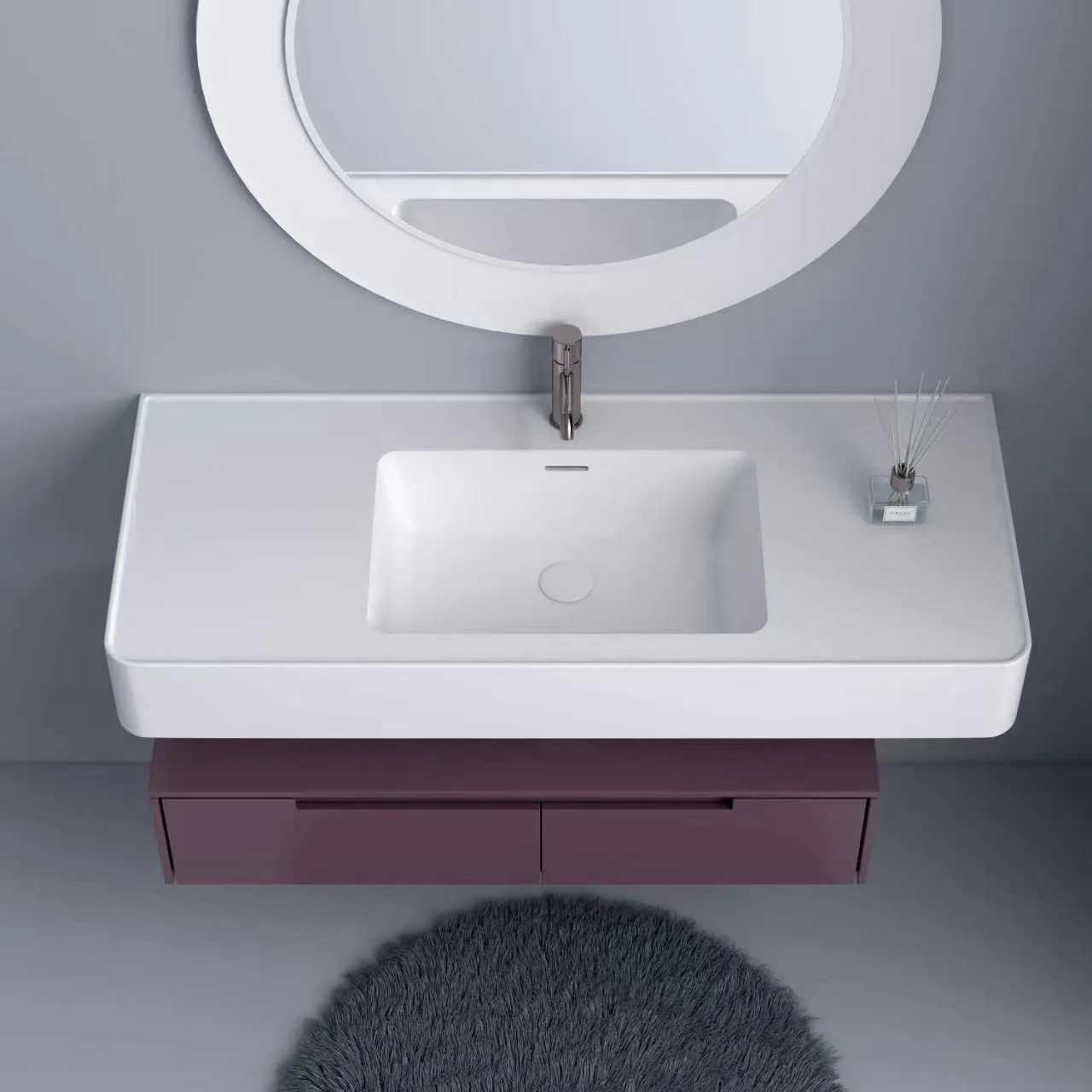 Overhead top-down view showcasing the offset rectangular interior basin, seamless integrated overflow, and functional asymmetric countertop layout of the matte white solid surface vanity sink.