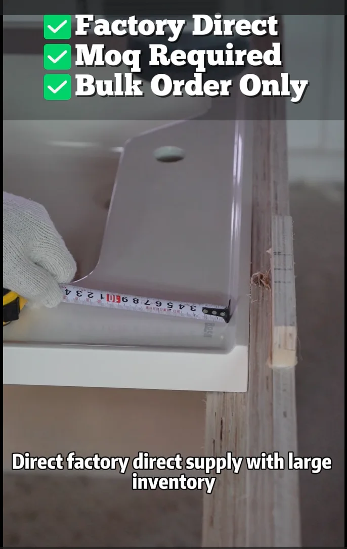 Factory technician performing edge flatness quality check on cultured marble vanity tops
