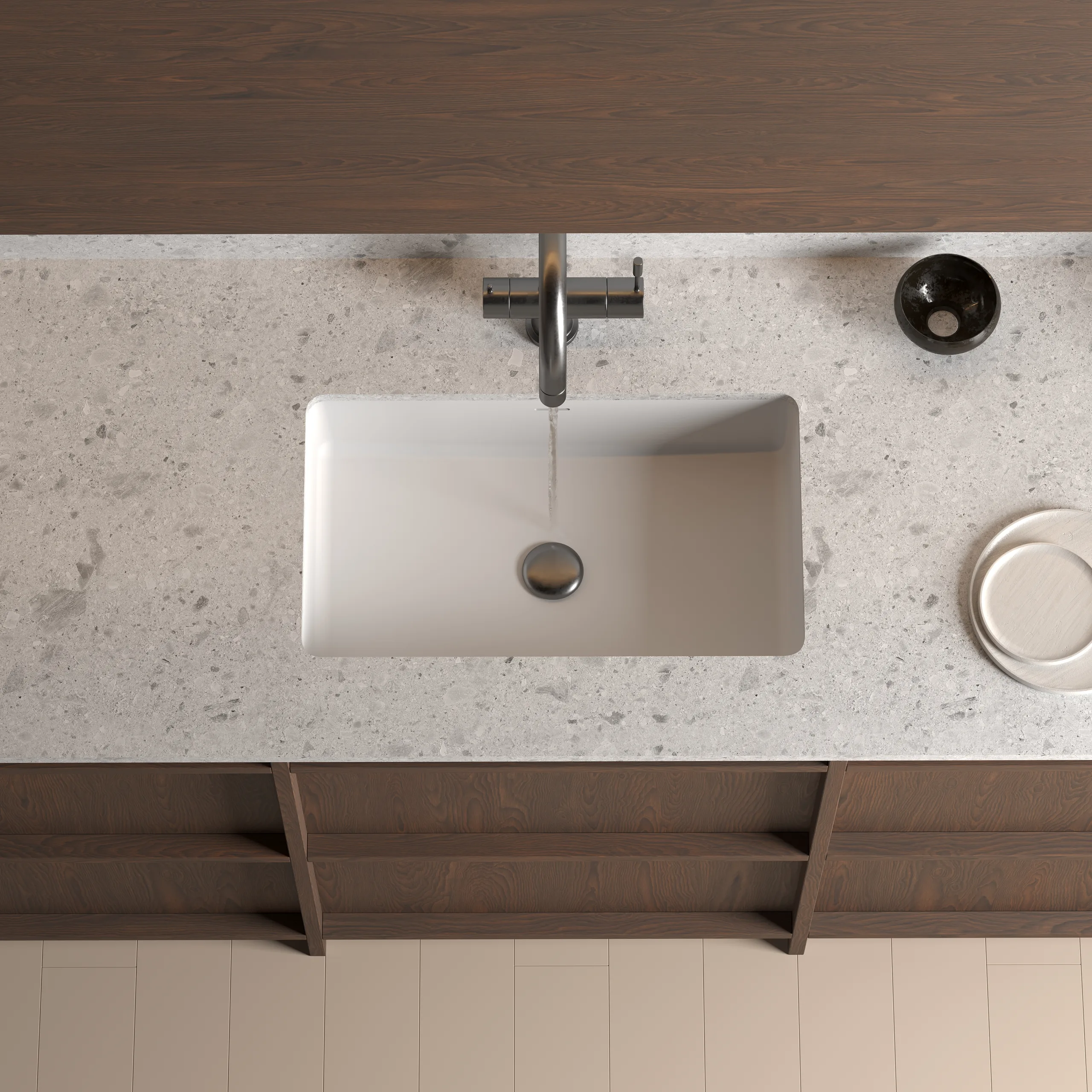 Matte White Solid Surface Rectangular Undermount Basin direct overhead view installed beneath white marble slab countertop.