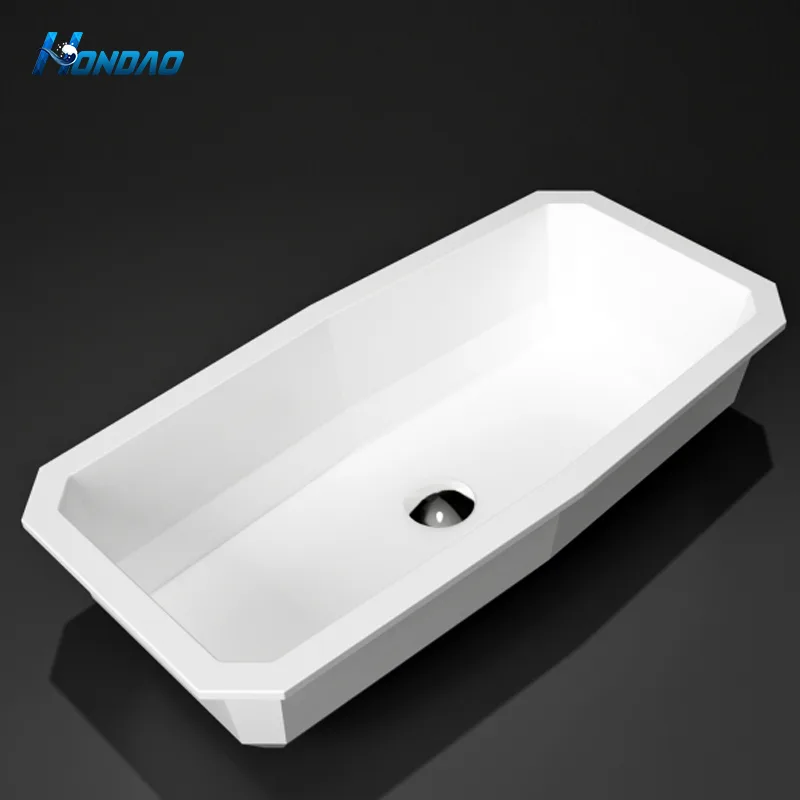 Matte White Solid Surface Chamfered Undermount Basin isolated perspective view showing faceted interior basin slopes and undermount flange.