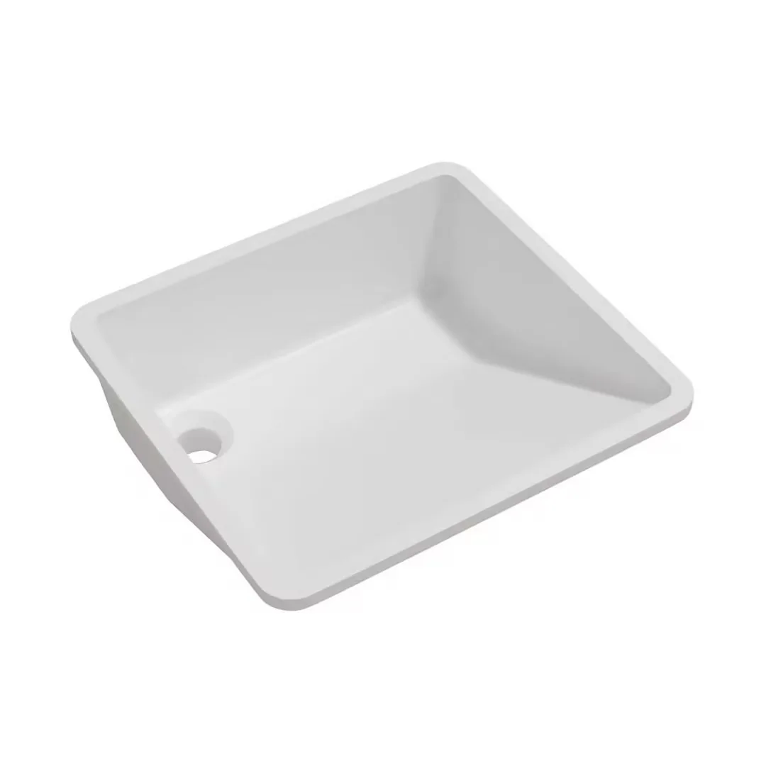 Matte White Solid Surface Ramp Undermount Basin three-quarter perspective highlighting the seamless inclined ramp geometry and crisp basin sidewalls.