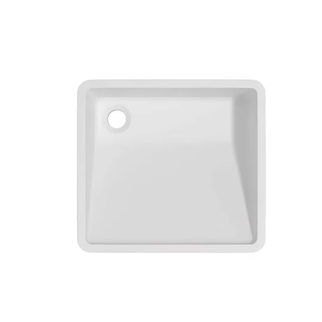 Matte White Solid Surface Ramp Undermount Basin direct overhead view showing the rectangular perimeter rim and offset corner drain opening.Matte White Solid Surface Ramp Undermount Basin